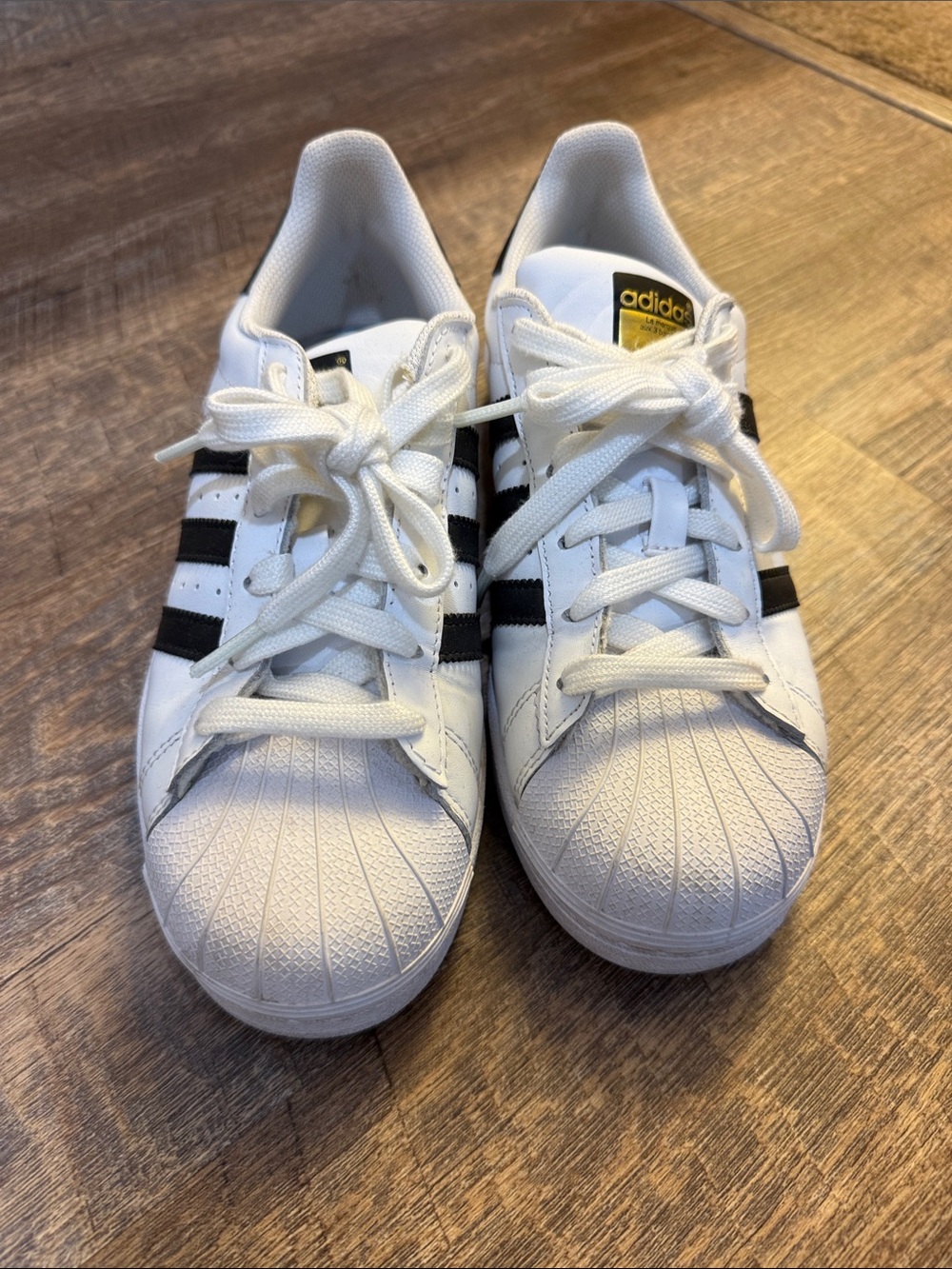 adidas Kids Superstar Sneakers in White and Black with Gold Logo